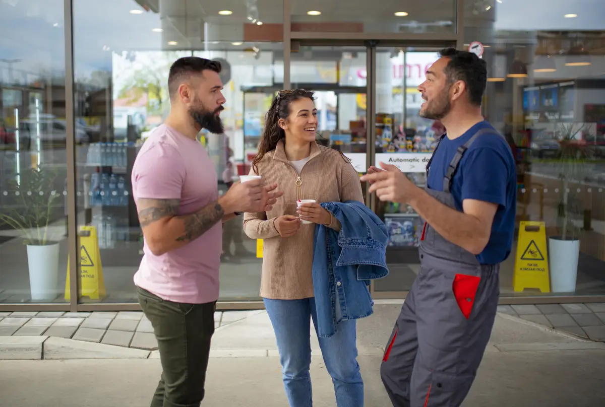 People spending time at the gas station